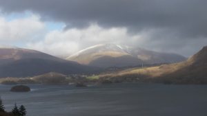 Looking across Derwent Water towards Blencathra under looming skies